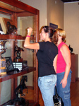 People observing our display cases in the Roemer/USDF Hall of Fame.