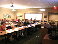 People listing to education session in Grand Prix Seminar Room. 