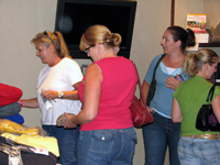 People browsing the Lendon F. Grey bookstore